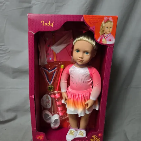 OUR GENERATION INDY DOLL – PINK DRESS WITH ACCESSORIES