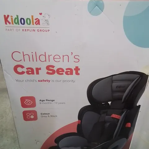 BOXED KIDOOLA CHILDREN'S CAR SEAT