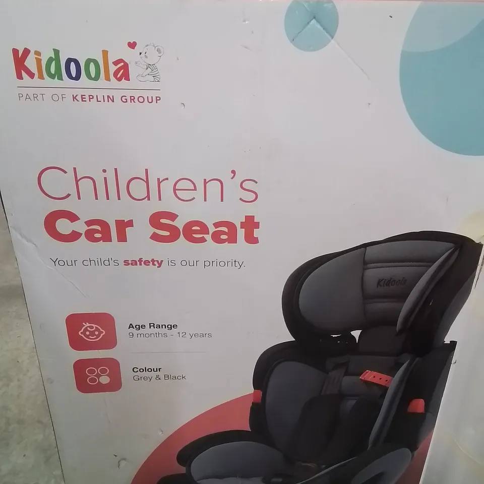 BOXED KIDOOLA CHILDREN'S CAR SEAT