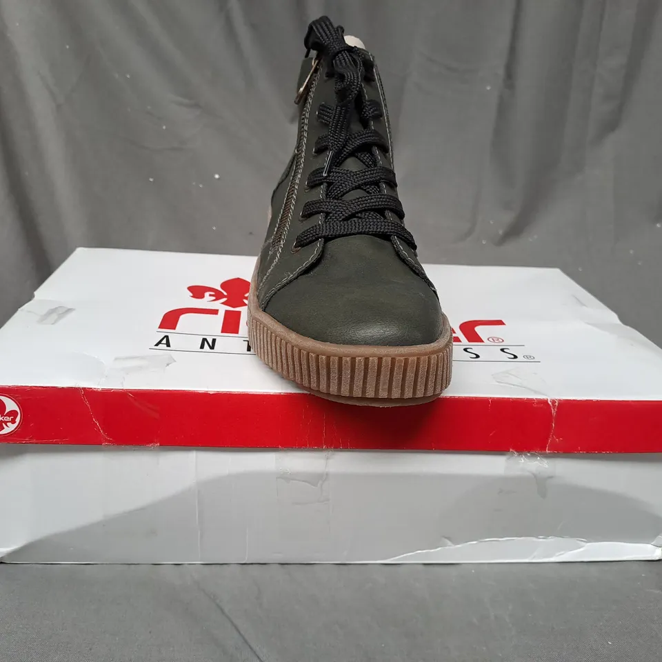 BOXED PAIR OF RIEKER HIGH TOP CUFFED TRAINERS IN KHAKI SIZE 6