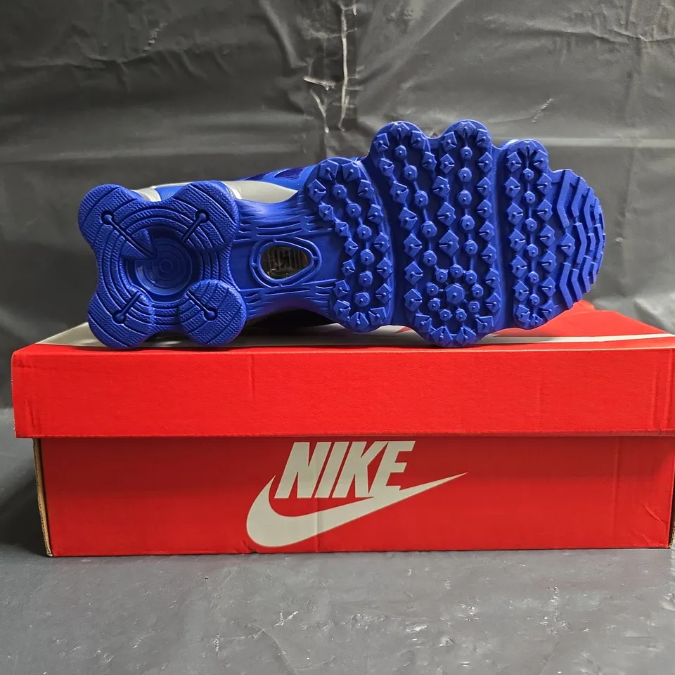 BOXED PAIR OF NIKE SHOX TRAINERS IN BLUE SIZE UK 6