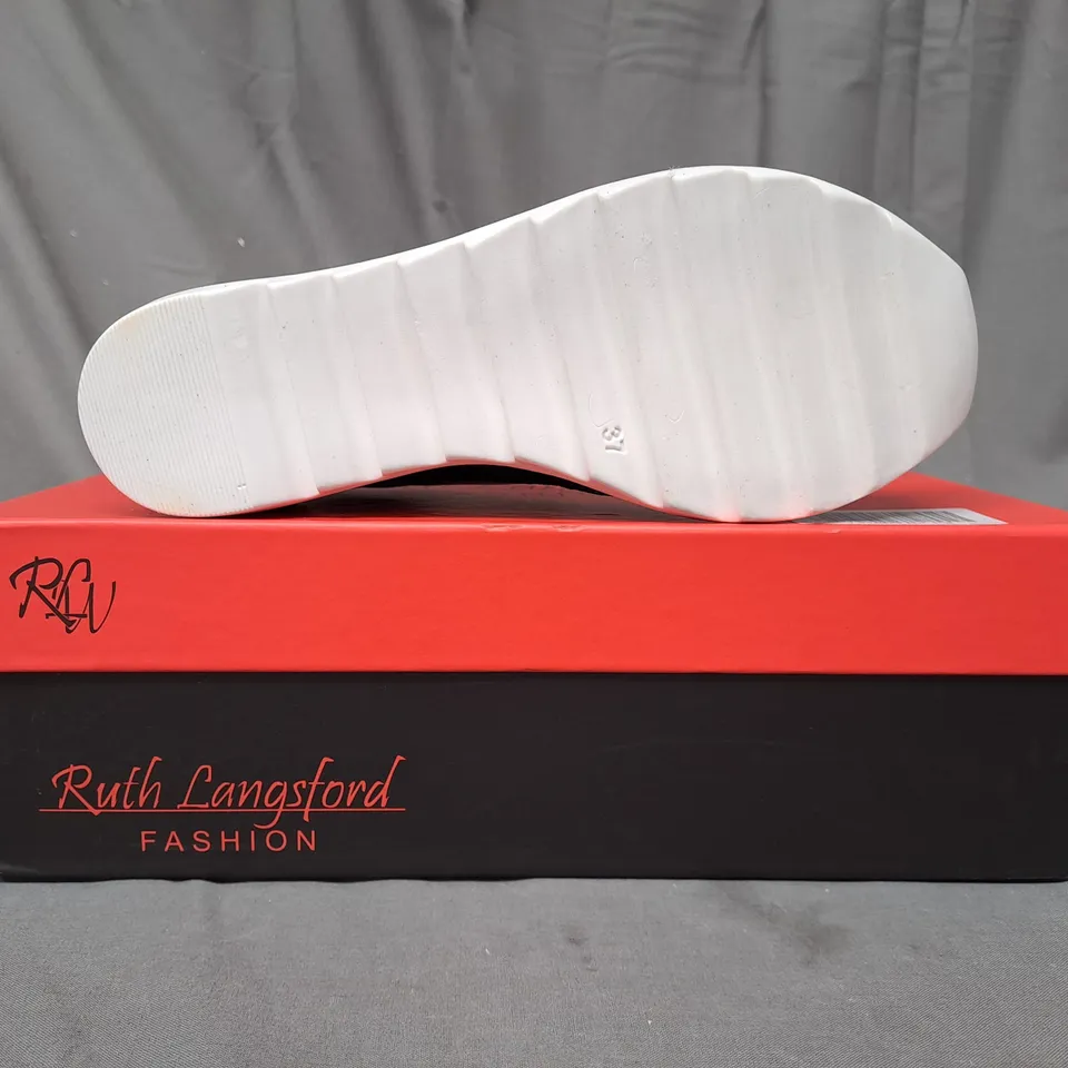 BOXED PAIR OF RUTH LANGSFORD WEDGE TRAINERS IN BLACK SIZE 4