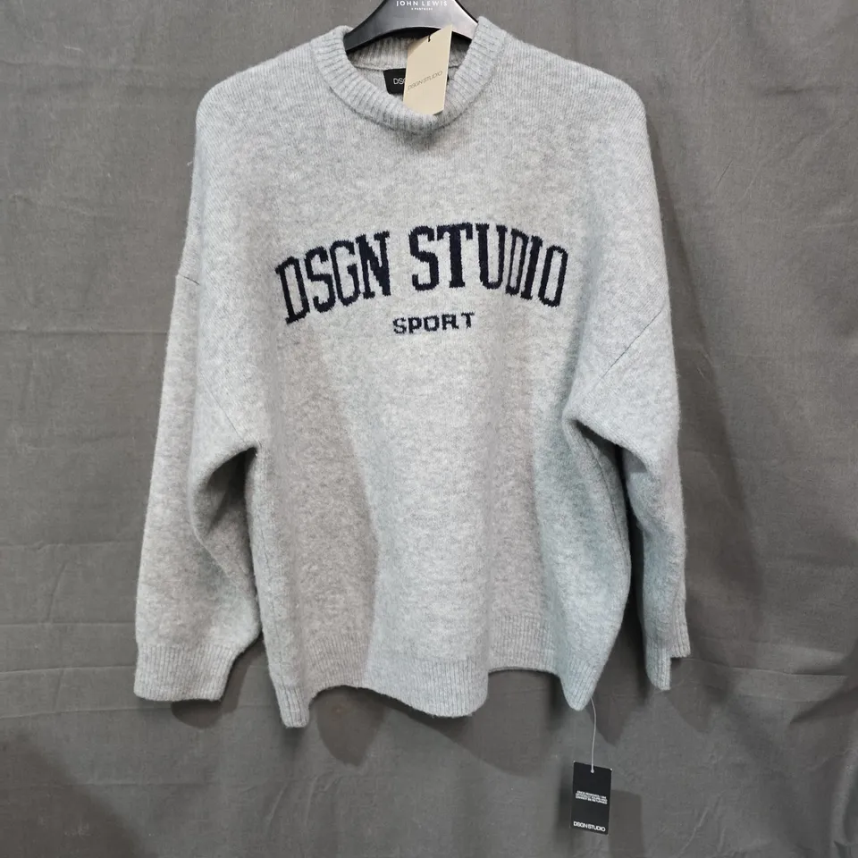 BOX OF APPROXIMATELY 25 CLOTHING ITEMS INCLUDING:DSGN STUDIO JUMPER, SURPLUS TEX VINTAGE CARGO PANTS AND JACK AND JONES BLACK JEANS.