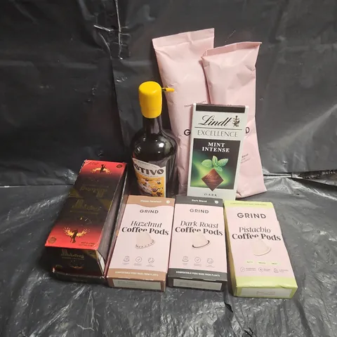 APPROXIMATELY 10 ASSORTED FOOD ITEMS TO INCLUDE - LINDT MINT DARK CHOCOLATE - GRIND COFFEE PODS - BOTIVO NON-ALCOHOLIC - ETC