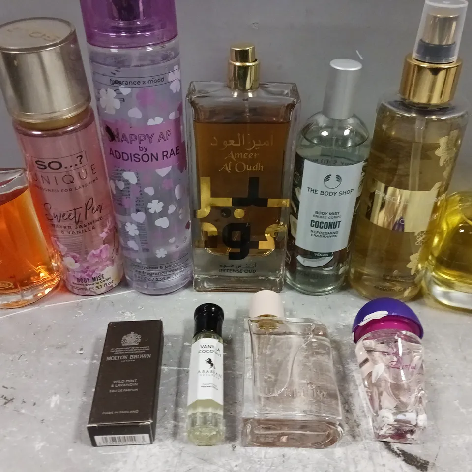 APPROX 10 ASSORTED UNBOXED FRAGRANCES TO INCLUDE SO...? SWEET PEA, THE BODY SHOP COCONUT, BURBERRY, ETC 