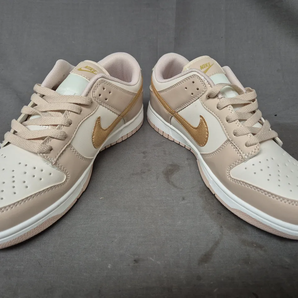 BOXED PAIR OF NIKE ZOOM RIVAL MULTI SHOES IN BEIGE/CREAM/GOLD UK SIZE 8.5