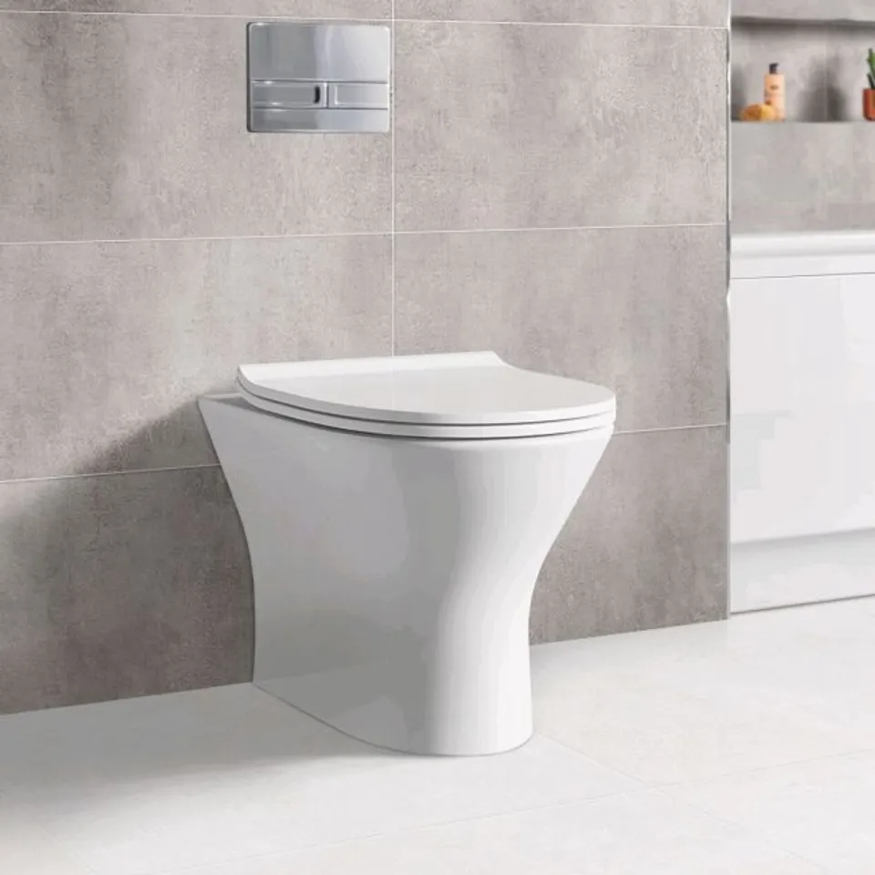 BRAND NEW BOXED PORTLAND BACK TO WALL TOILET