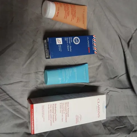CLARINS SKINCARE GIFT SET IN RED BOX – MULTI-PRODUCT COLLECTION