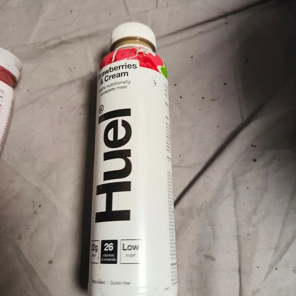 APPROXIMATELY 6 ASSORTED DRINKS INCLUDING HUEL STRAWBERRIES & CREAM , LUCOZADE ZERO SUGAR AND DIET PEPSI