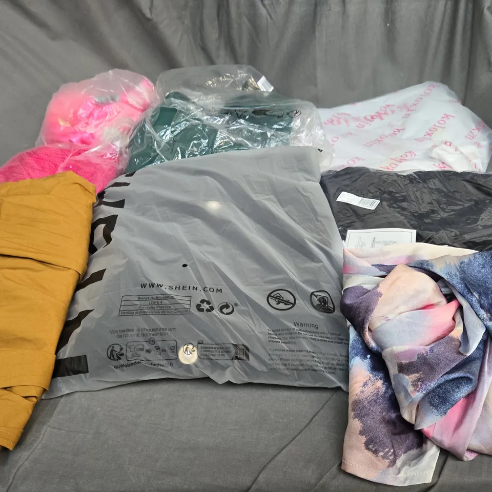 LARGE BOX OF ASSORTED CLOTHING ITEMS IN VARIOUS COLOURS, SIZES AND STYLES