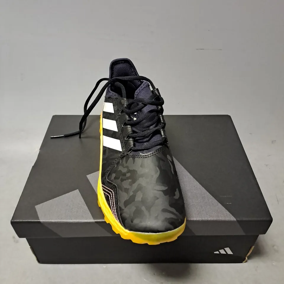 BOXED PAIR OF ADIDAS HOCKEY YOUNGSTAR JUNIOR SHOES IN BLACK CAMO/YELLOW SIZE 5 1/2