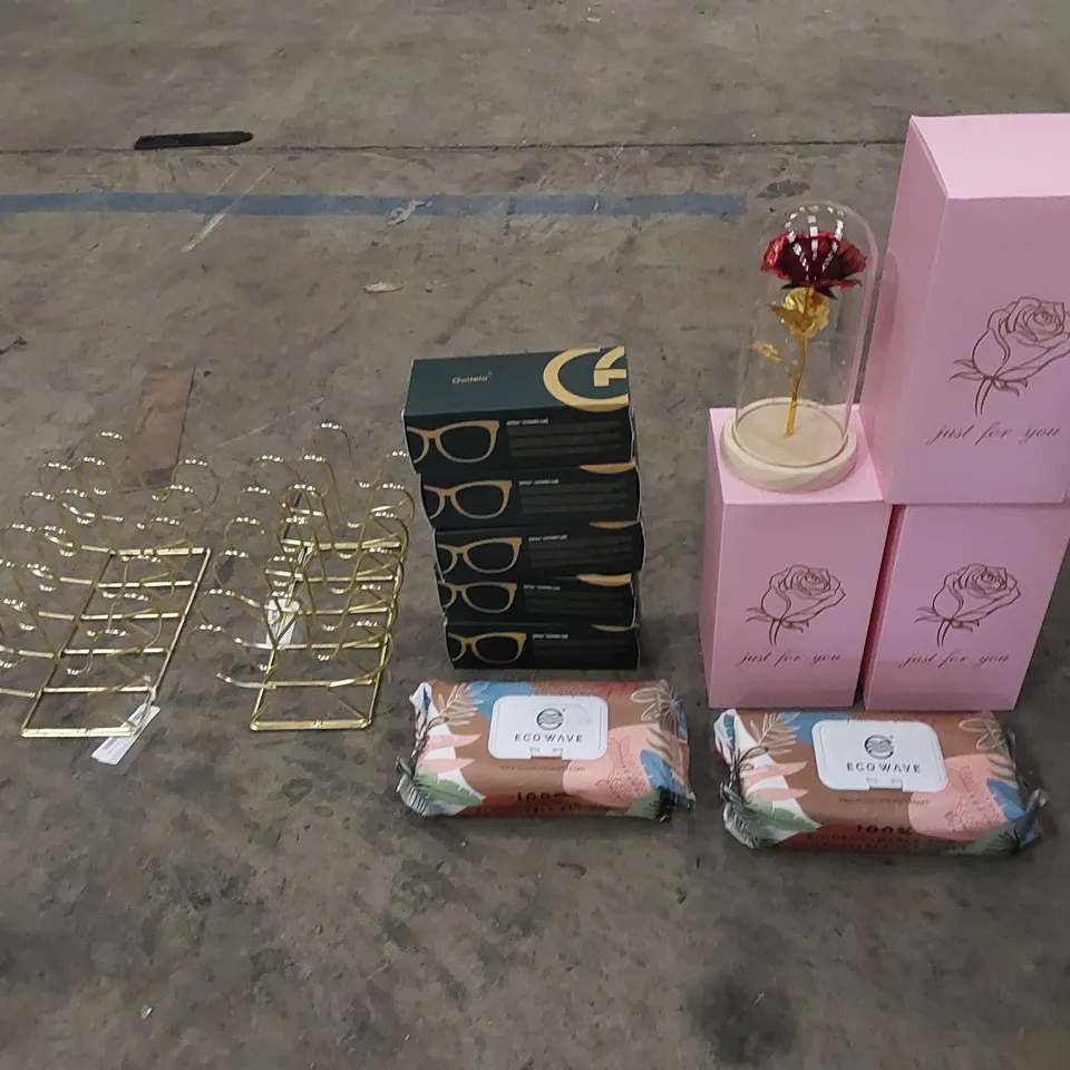 PALLET TO CONTAIN ASSORTED HOUSEHOLD ITEMS AND CONSUMER PRODUCTS. INCLUDING PET WIPES, FILE ORGANISERS, GLASSES, DECORATIVE ROSES ETC