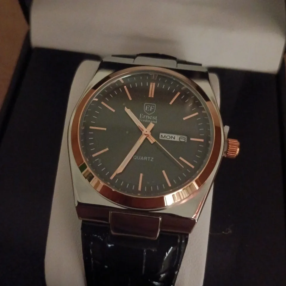 ERNEST FERDINAND QUARTZ WRISTWATCH – BLACK DIAL, ROSE GOLD COLOUR BEZEL, LEATHER STRAP