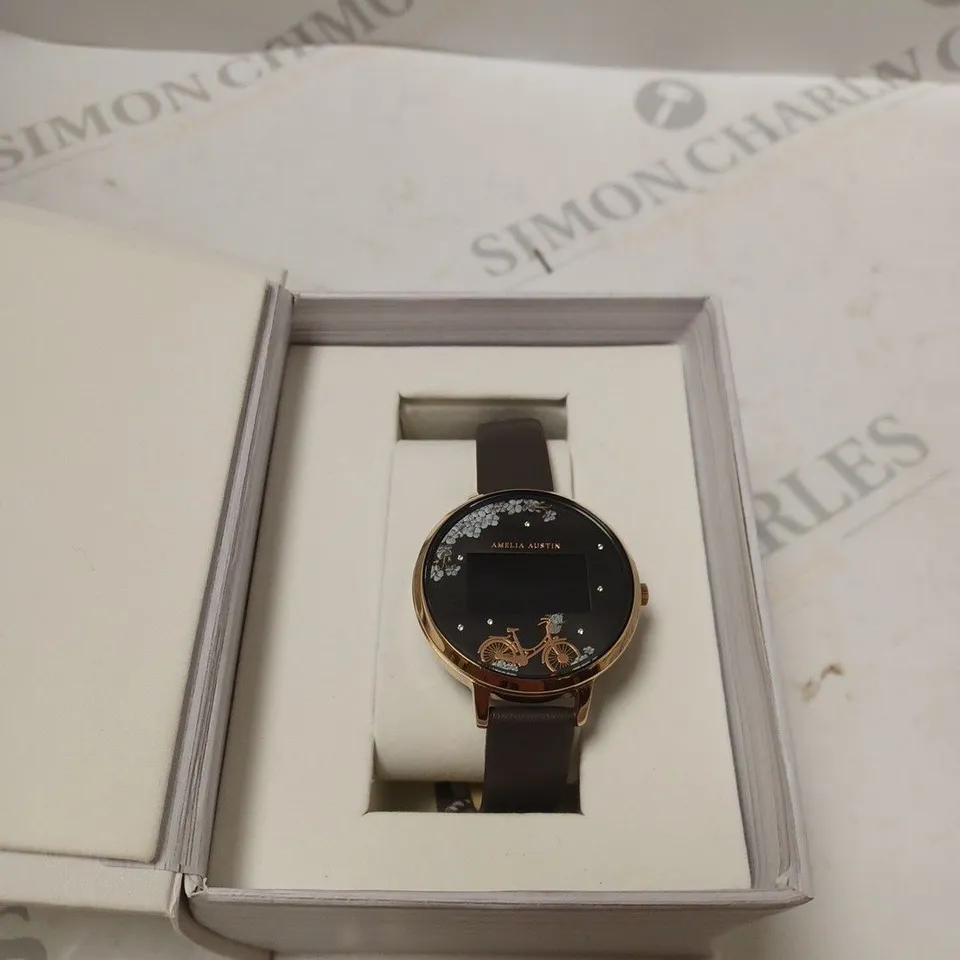 BOXED AMELIA AUSTIN GOLD DIGITAL WATCH WITH BIKE DETAIL 