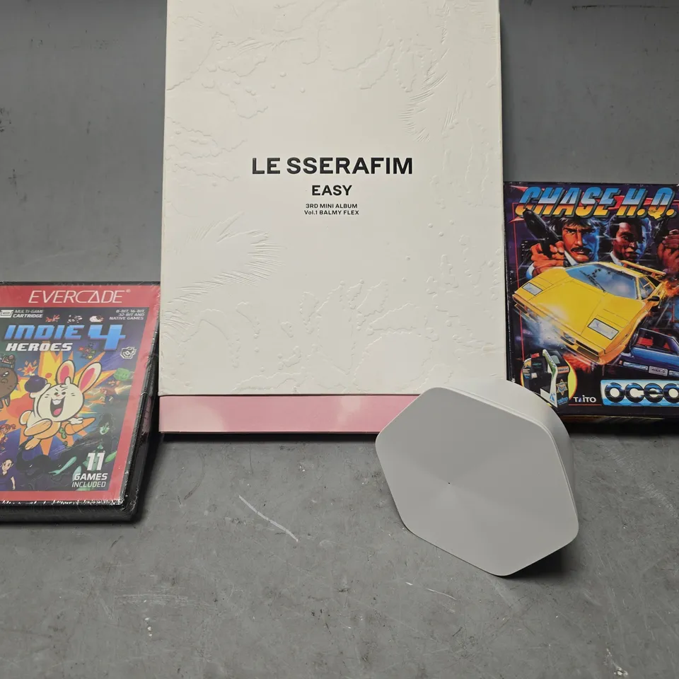 APPROXIMATELY 8 ASSORTED ITEMS TO INCLUDE - CHASE H.Q OCEAN , EVERCADE INDIE 4 HEROS , LE SSERAFIM ETC