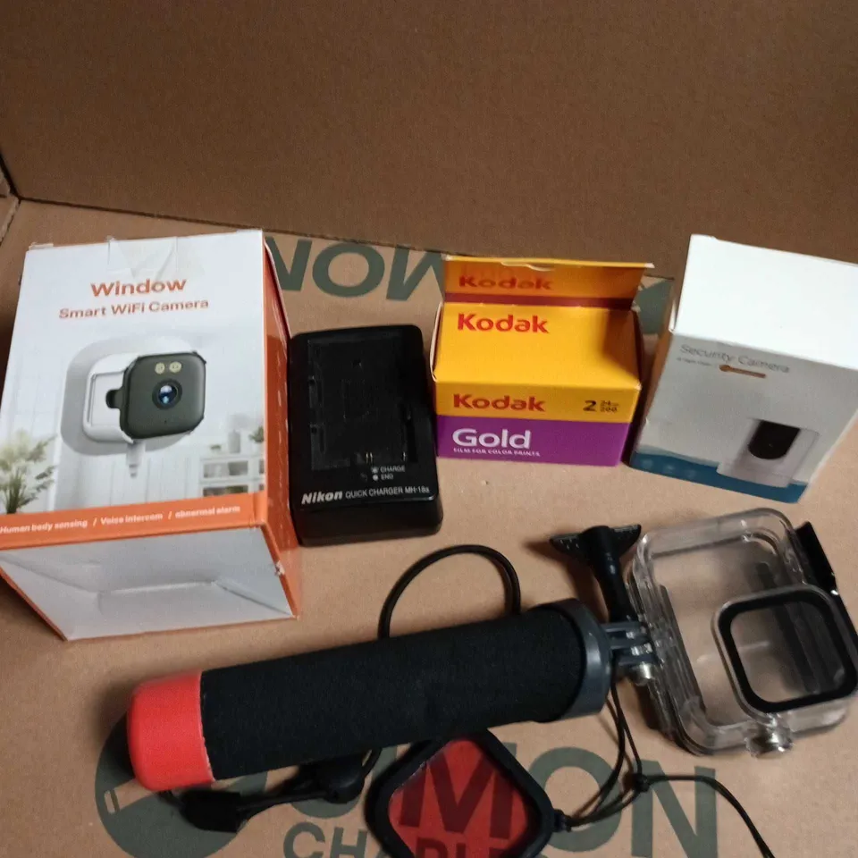APPROXIMATELY 10 ASSORTED CAMERA ACCESSORIES TO INCLUDE SECURITY CAMERA, HOLDER, COLOUR PRINTS ETC 