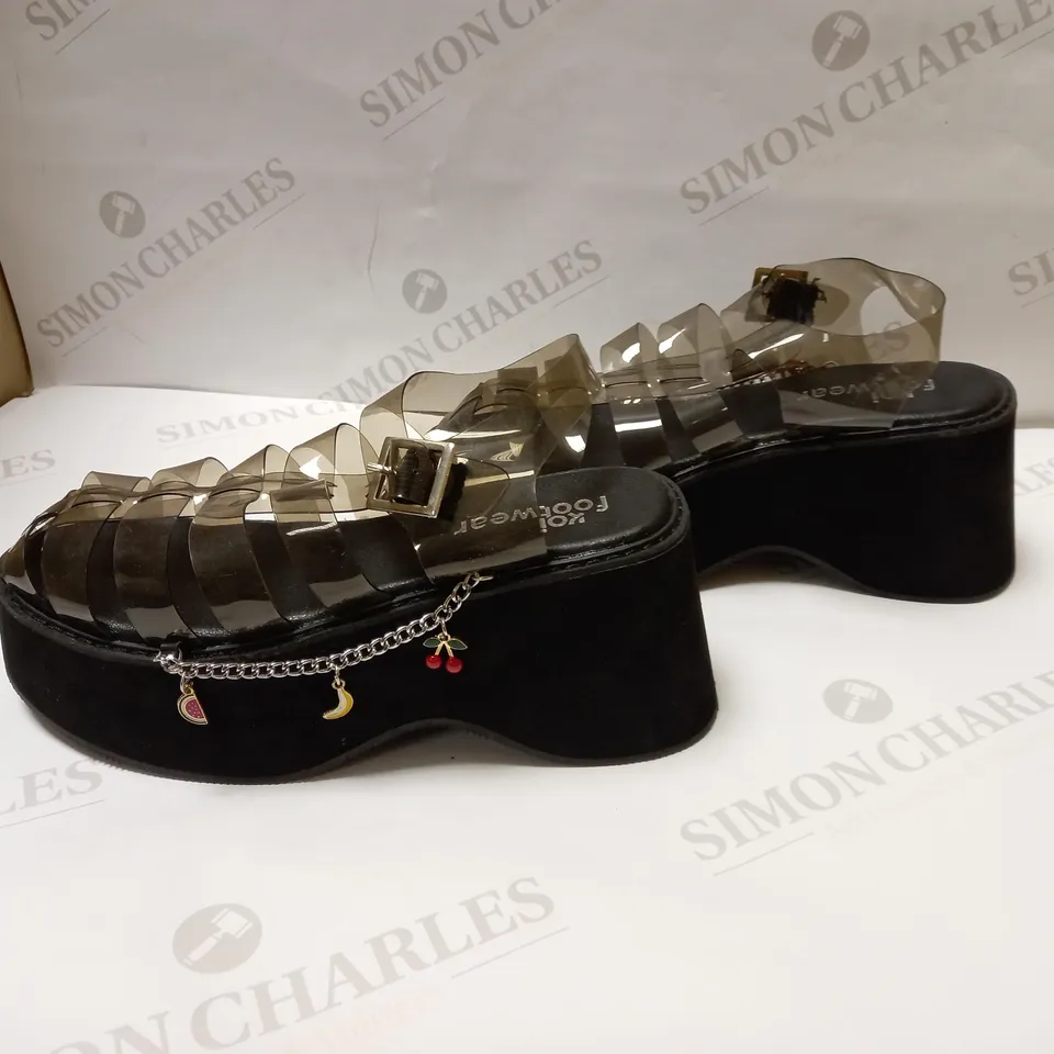 DESIGNER KOI VEGAN TUTTI FRUTTI BLACK JELLY FLATFORM SANDALS 