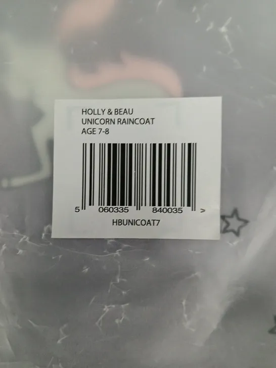 Lot 4223: HOLLY & BEAU COLOUR CHANGING UNICORN RAINCOAT – AGE 7-8 ...