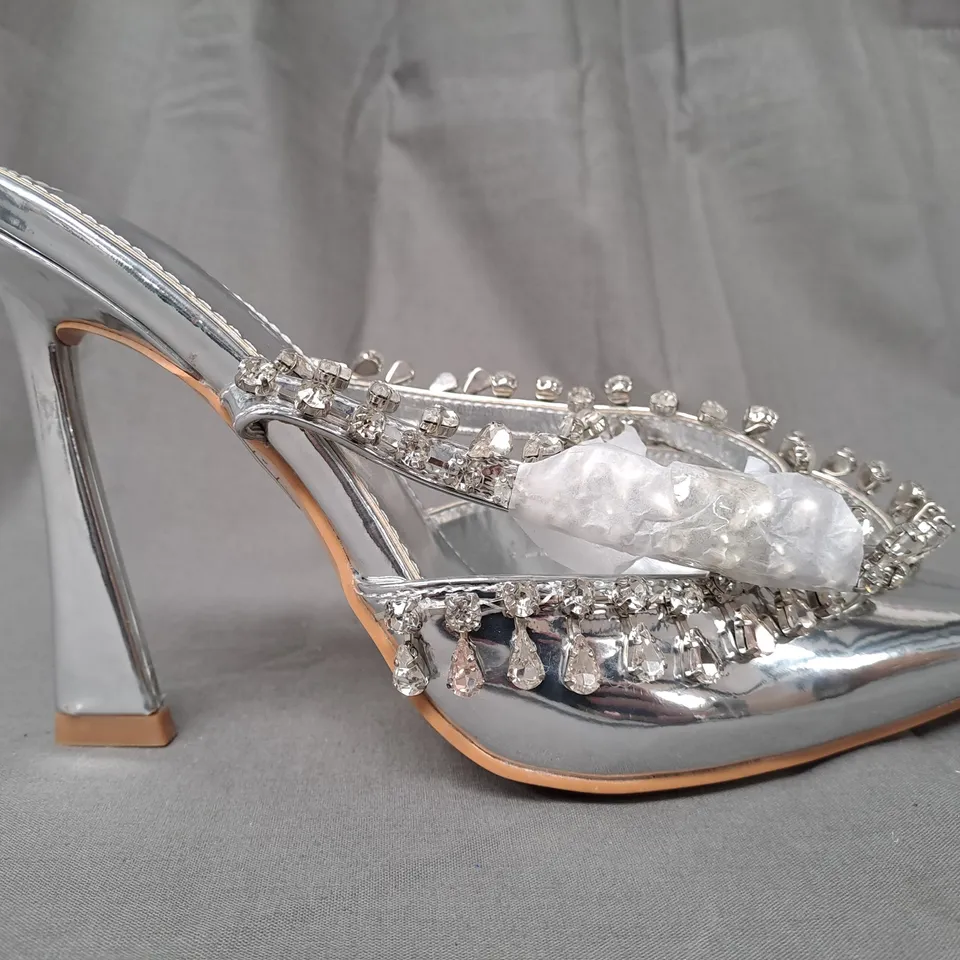 BOXED PAIR OF PUBLIC DESIRE POINTED TOE HEELED SHOES IN METALLIC SILVER W. JEWEL EFFECT SIZE 4