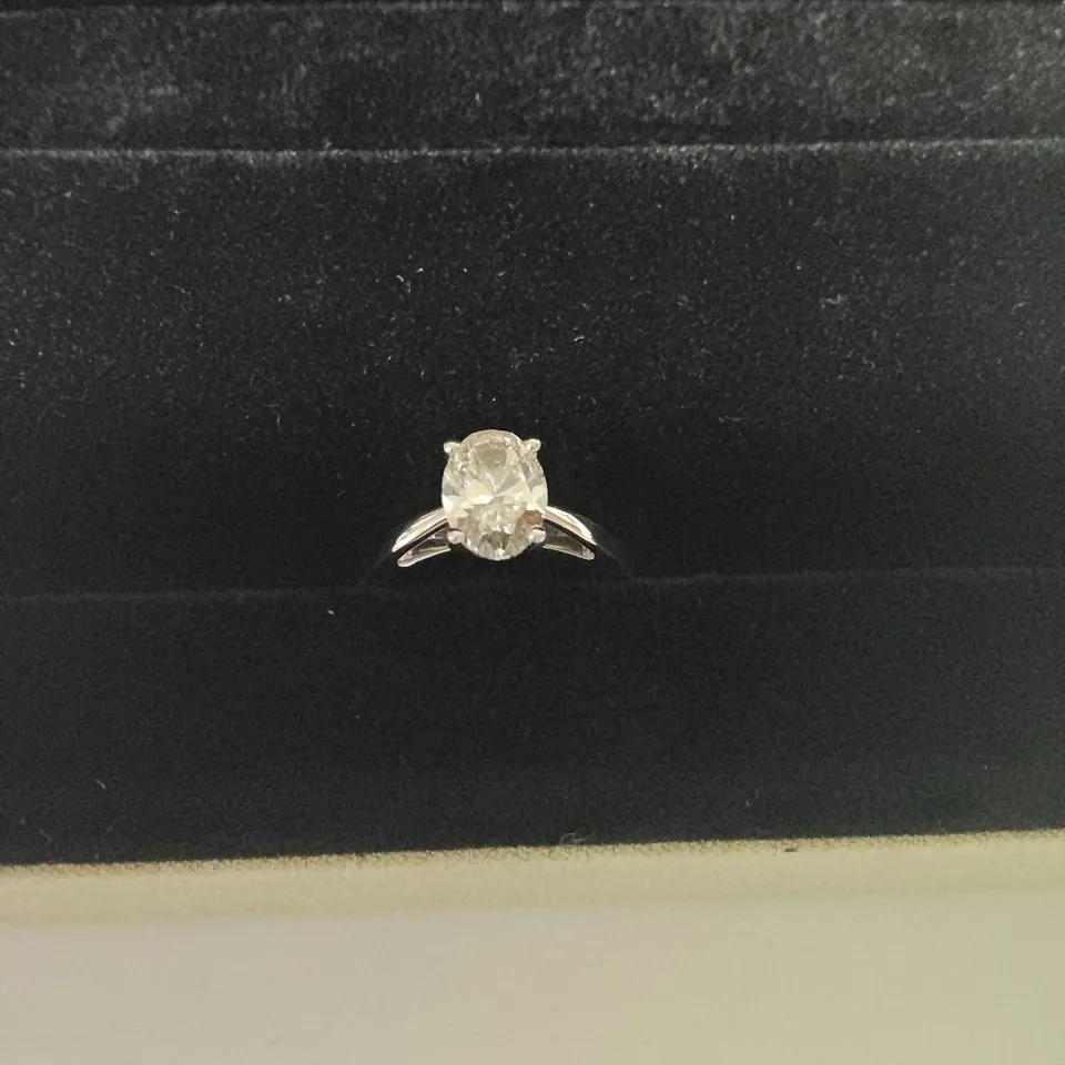 9CT WHITE GOLD SOLITAIRE RING SET WITH A LAB GROWN OVAL CUR DIAMOND WEIGHING +-1.53CT
