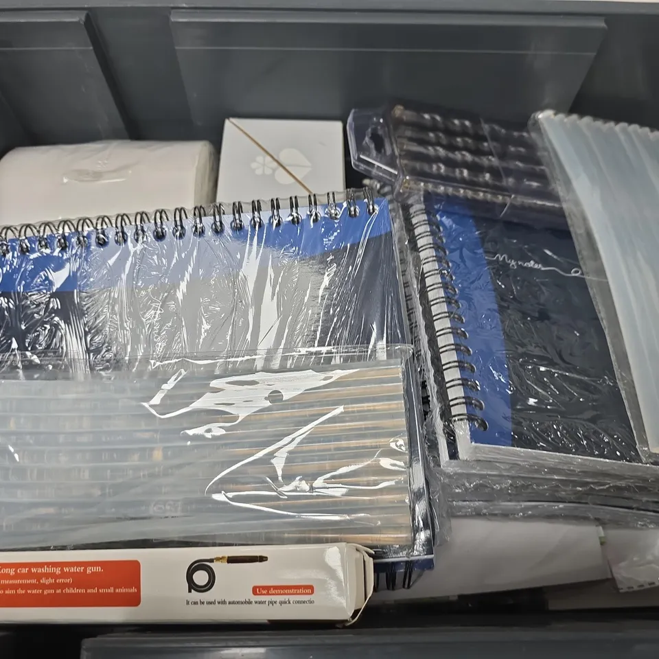 APPROXIMATELY 12 ASSORTED HOUSEHOLD ITEMS TO INCLUDE GLUE GUN STICKS, OXFORD NOTEBOOKS, ECOVER DISHWASHER TABLETS, ETC