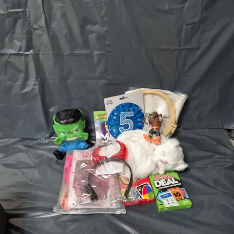 APPROXIMATELY 12 ASSORTED TOYS & GAMES TO INCLUDE KOFI KINGSTON FIGURINE, MONOPOLY DEAL CARD GAME, MAKE YOUR OWN SLIME KIT, ETC