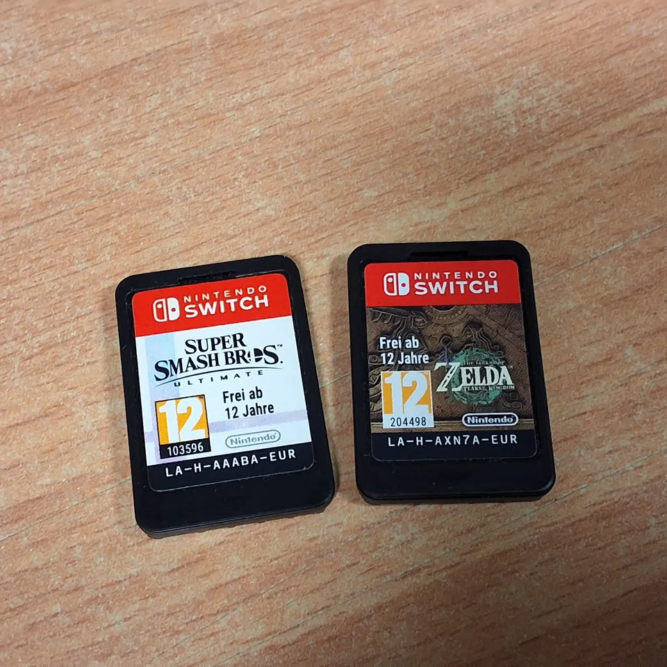 LOT OF 4 ASSORTED UNBOXED NINTENDO SWITCH GAMES TO INCLUDE ZELDA, MARIO AND MIITOPIA