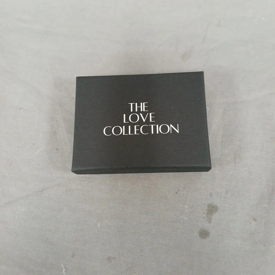 THE LOVE COLLECTION. GOLD PLATED STERLING SILVER SHELL STUD EARRINGS