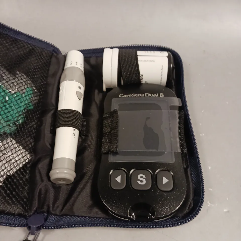 BOXED CARESENS DUAL BLOOD GLUCOSE MONITORING SYSTEM 