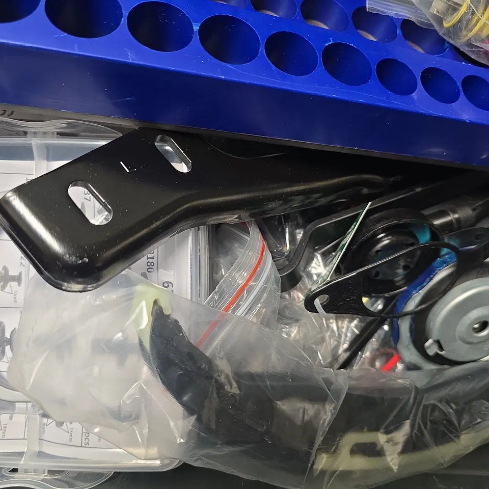 APPROXIMATELY 10 ASSORTED ITEMS TO INCLUDE - PLASTIC WATER REPELLENT , JAGUAR CAR KEY , HEAVY DUTY BICYCLE INNER TUBE ETC
