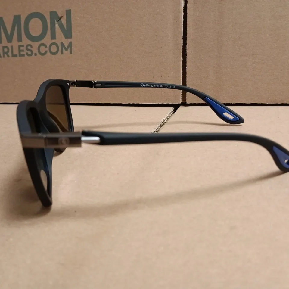 BOXED PAIR OF RAY BAN POLARIZED GLASSES WITH BLACK FRAMES