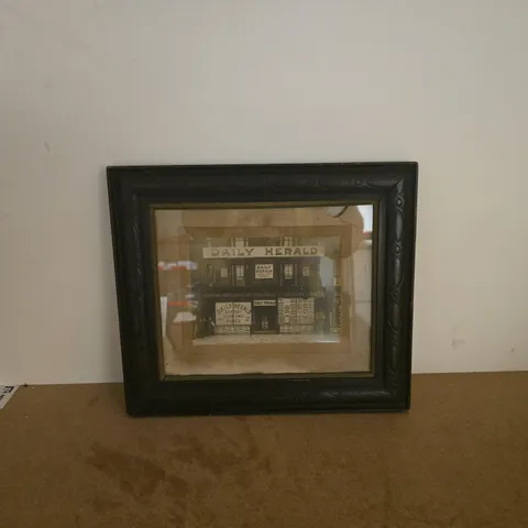 VINTAGE FRAMED PHOTOGRAPH OF DAILY HERALD "LABOURS DAILY CHAMPION" SHOP FRONT