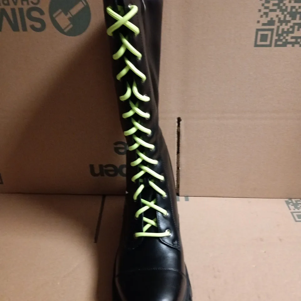 BOXED KOI BLACK KNEE-HIGH COMBAT BOOT WITH NEON LIME LACES AND MOON-&-STAR EMBROIDERY - UK 6