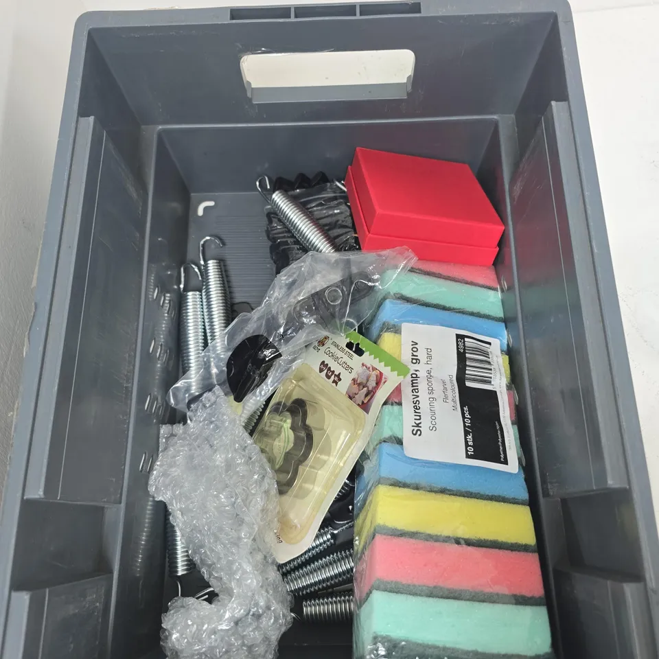 TOTE OF ASSORTED HOUSEHOLD ITEMS TO INCLUDE; TAPE DISPENSER, CLOCK, SPONGES, SPRINGS. 