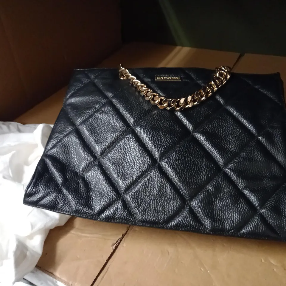 RUSSELL AND BROMLEY STRAPPED BLACK LEATHER BAG