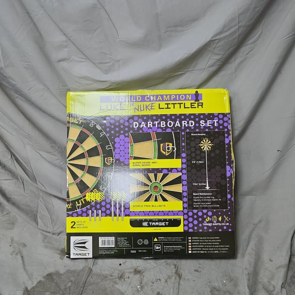 TARGET LUKE LITTLER DARTBOARD, WITH DARTS INCLUDED. BOXED