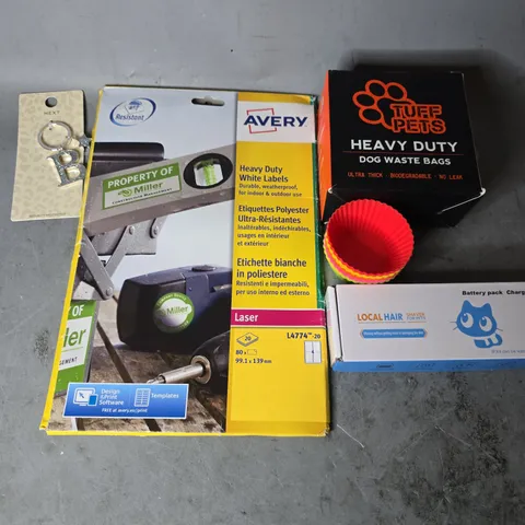 APPROXIMATELY 9 ASSORTED ITEMS TO INCLUDE - TUFF PETS DOG WASTE BAGS , NEXT B KEYCHAIN , LOCAL HAIR SHAVER ETC