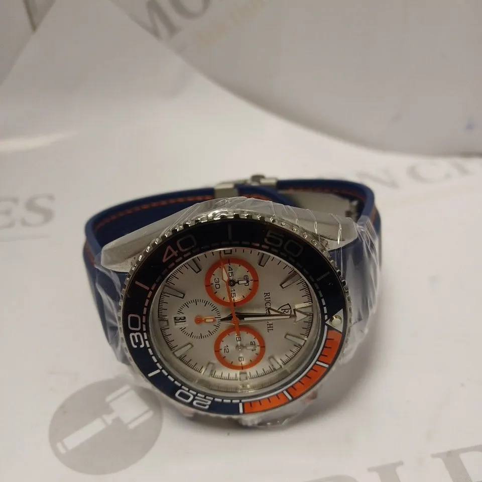 MEN’S RUCKSTUHL CHRONOGRAPH R400 WATCH – SILVER COLOUR CASE – SILVER DIAL – 3ATM WATER RESISTANT – BLUE RUBBER STRAP 
