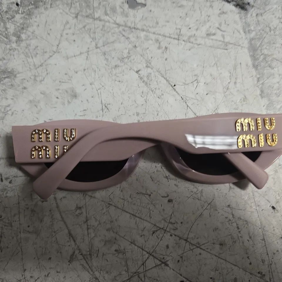 PAIR OF MUI MUI SUNGLASSES - SMU11S