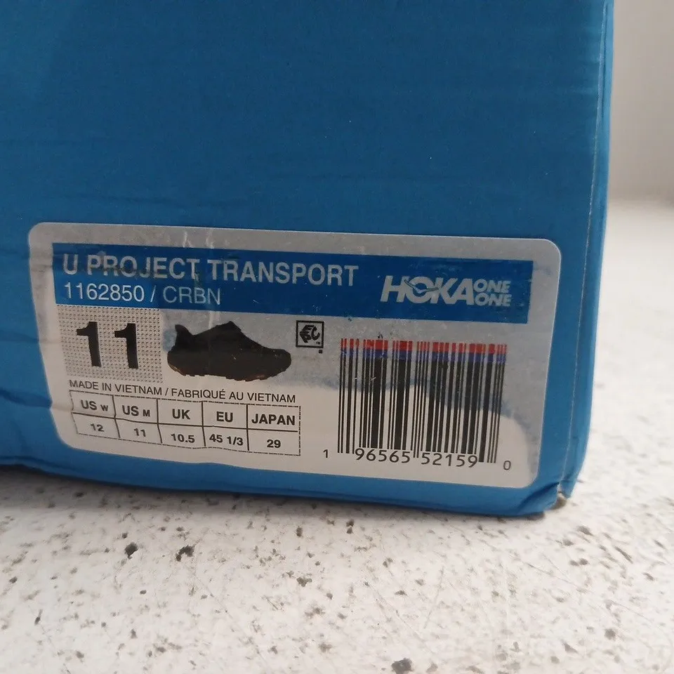 BOXED PAIR OF HOKA ONE ONE U PROJECT TRANSPORT TRAINERS - SIZE 10.5