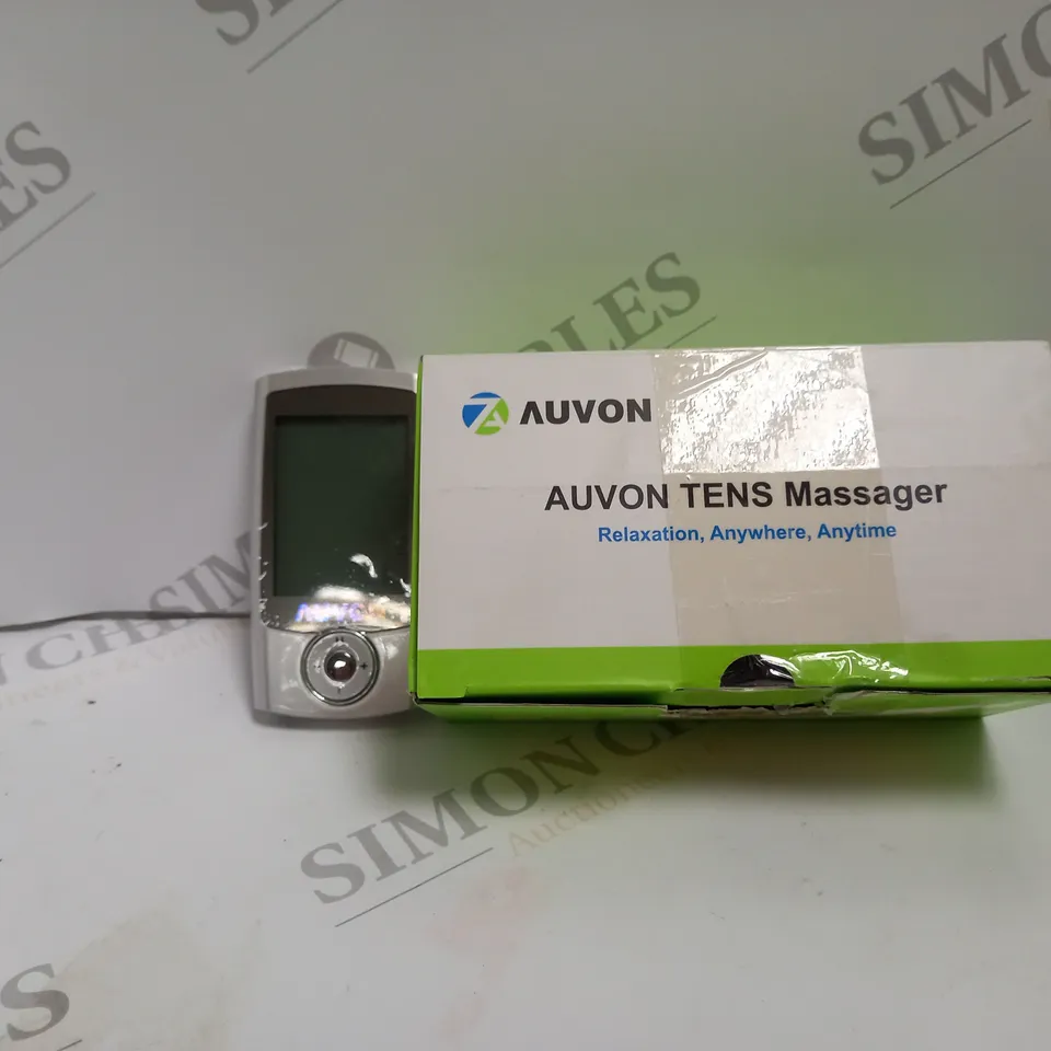 BOXED AUVON TENS MASSAGER 