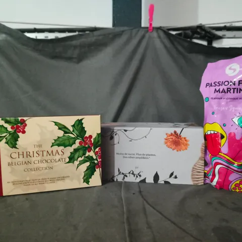 APPROXIMATELY 5 ASSORTED FOOD AND DRINK ITEMS TO INCLUDE CHRISTMAS BELGIAN CHOCOLATE COLLECTION, PASSION FRUIT MARTINI ALCOHOLIC SORBET, ETC