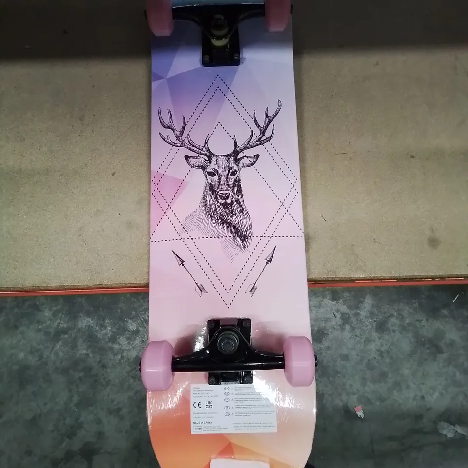 BOXED NEW KIDS PINK SKATEBOARD WITH STAG DESIGN 