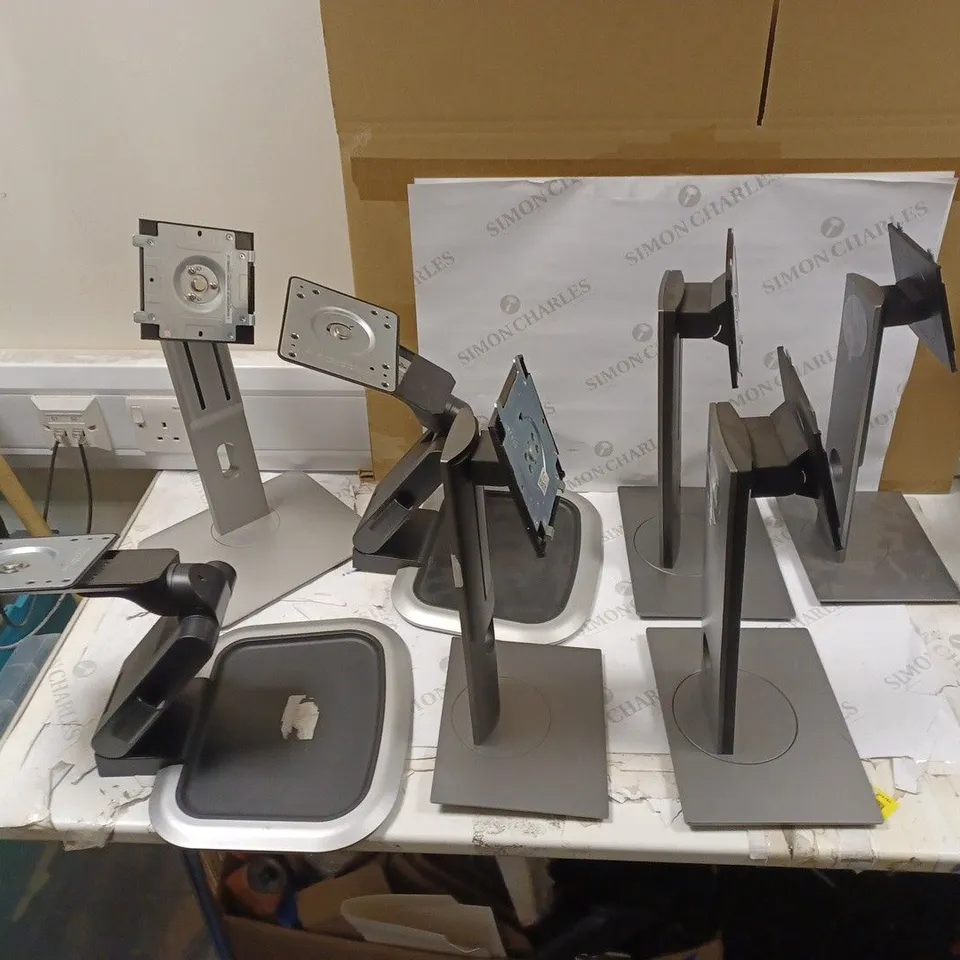 LOT OF 7 MONITOR STANDS WITH SWIVAL DELL STANDS, AND ADJUSTABLE UNDISCLOSED MONITOR STAND