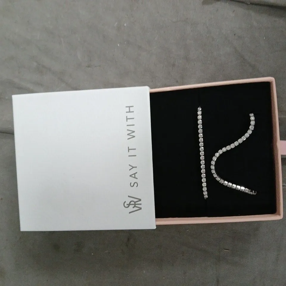 BOX OF APPROXIMATELY 10 ASSORTED ITEMS TO INCLUDE: ICONIC QUICK GLOW AND JEWELLERY 