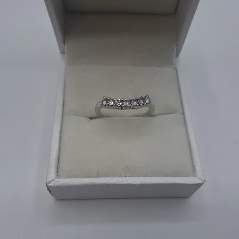 PLATINUM SEVEN STONE CURVED HALF ETERNITY RING SET WITH NATURAL DIAMONDS