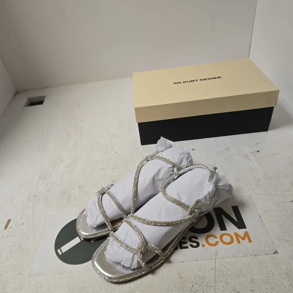 KURT GEIGER WOMEN’S SILVER STRAPPY SANDALS – UK4 (EU37)
