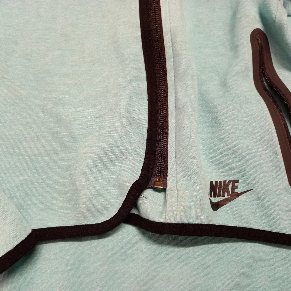 NIKE CHILDRENS TURQUOISE JACKET - 8-10 YEARS