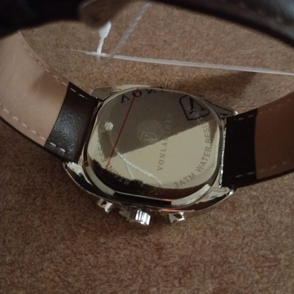 VONLANTHEN AVIATION WATCH FEATURING A GREEN DIAL AND A BROWN LEATHER STRAP 
