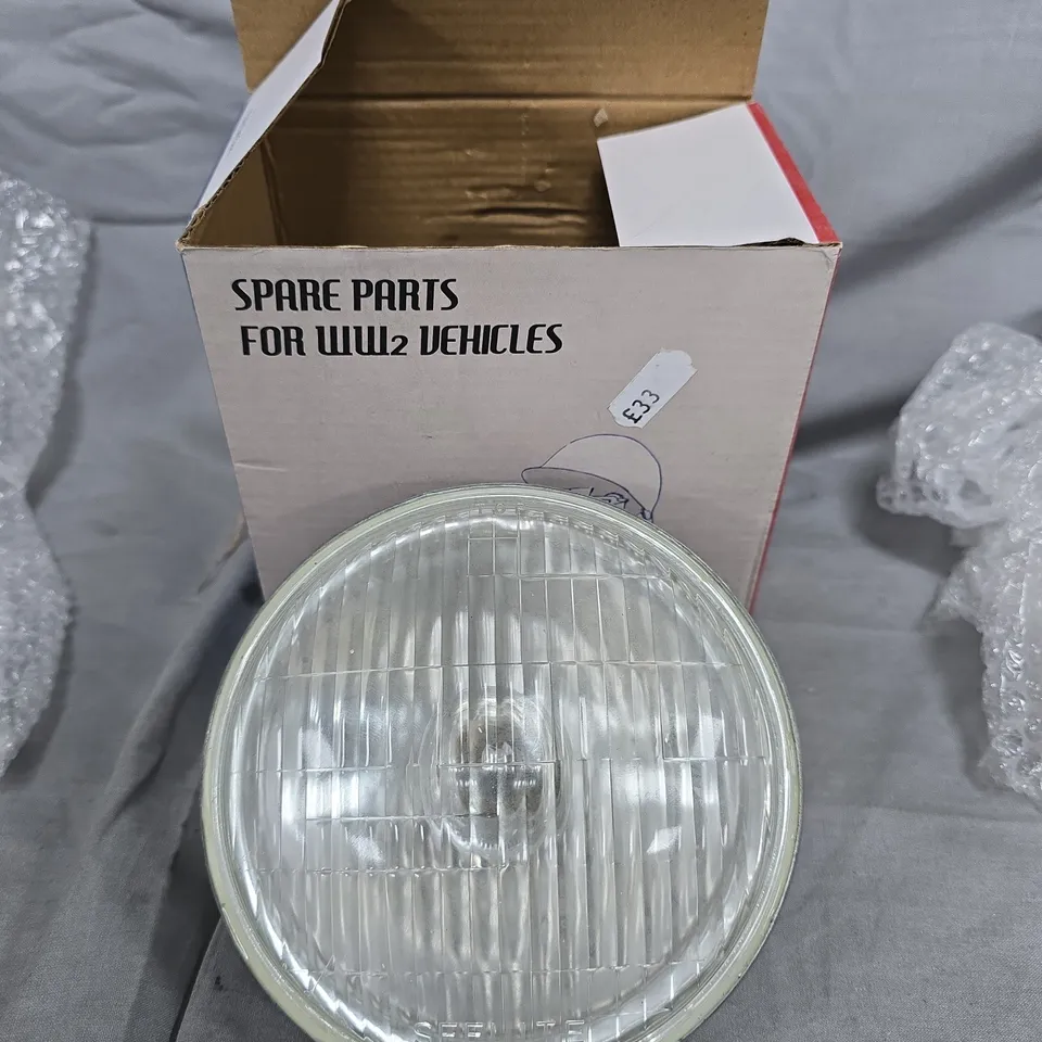 WWII Vehicle Headlight Spare Part – Boxed 